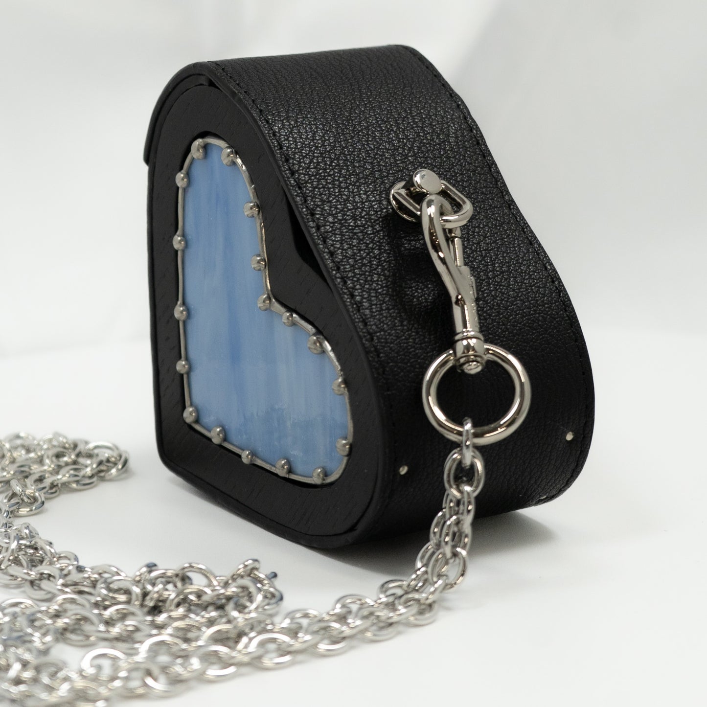 Heart small black with blue glass