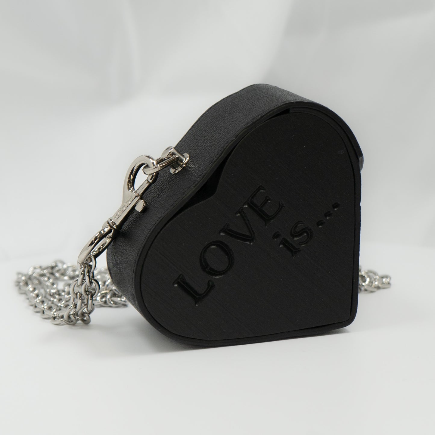 Heart small black with blue glass