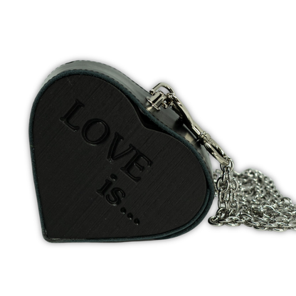 Litle Heart bag. Black leather with red glass