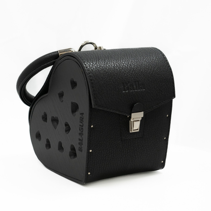 Heart large. Black leather, black wood with glass elements